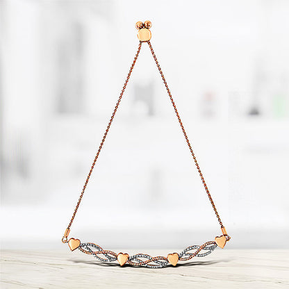 14K Rose Gold Plated .925 Sterling Silver Diamond Accent Layered Infinity Link and Heart Adjustable 4â€-10â€ Adjustable Bolo Bracelet (I-J Color, I3 Clarity)