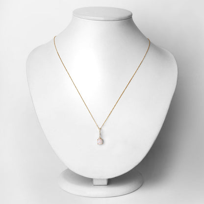 0.53 Carat Genuine Ethiopian Opal and White Diamond 10K Yellow Gold Pendant